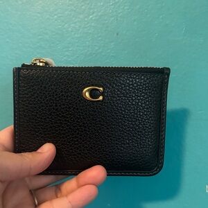 Coach Black Pebbled Leather Zip Card Case with Gold 'C'